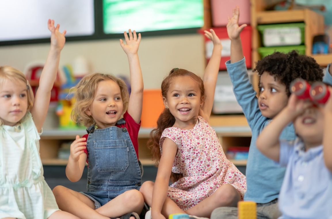 Smiling children engaged in playful learning